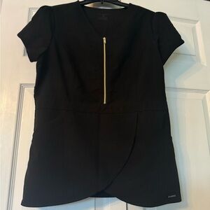 Peplum half zip scrub top